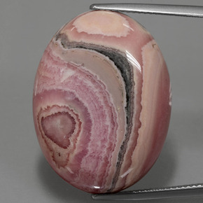 Rodocrosita multicolor natural de 51,53 ct, corte óvalo, opaco