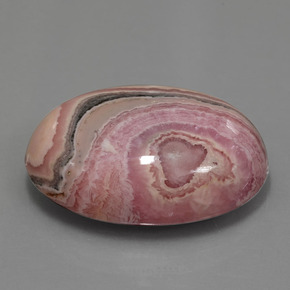 Rodocrosita multicolor natural de 51,53 ct, corte óvalo, opaco