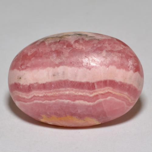 Rodocrosita multicolor natural de 35,96 ct, corte óvalo, opaco