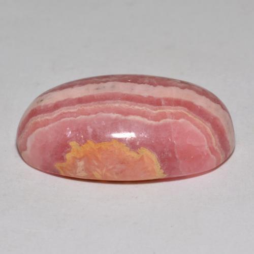 Rodocrosita multicolor natural de 35,96 ct, corte óvalo, opaco