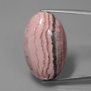 Rodocrosita multicolor natural de 62,39 ct, corte óvalo, opaco