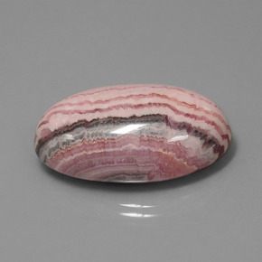 Rodocrosita multicolor natural de 62,39 ct, corte óvalo, opaco