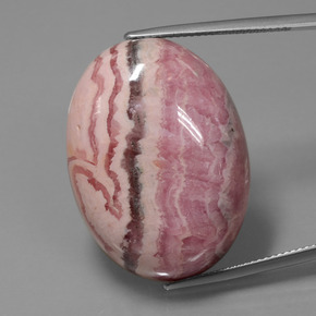 Rodocrosita multicolor natural de 60,57 ct, corte óvalo, opaco