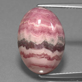 Rodocrosita multicolor natural de 14,59 ct, corte óvalo, opaco