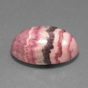 Rodocrosita multicolor natural de 14,59 ct, corte óvalo, opaco