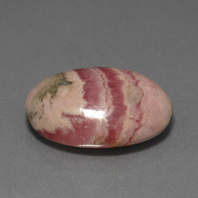 Rodocrosita multicolor natural de 12,73 ct, corte óvalo, opaco