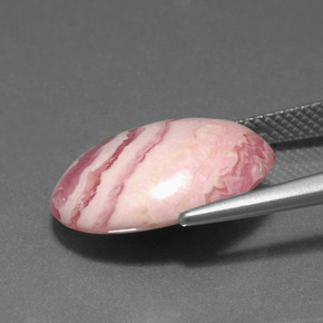 Rodocrosita multicolor natural de 11,83 ct, corte óvalo, opaco