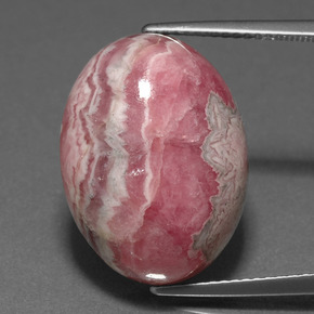 Rodocrosita multicolor natural de 23,84 ct, corte óvalo, opaco