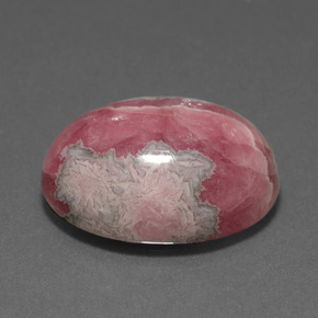 Rodocrosita multicolor natural de 23,84 ct, corte óvalo, opaco