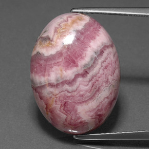 Rodocrosita multicolor natural de 20,81 ct, corte óvalo, opaco