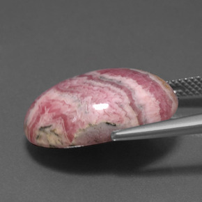 Rodocrosita multicolor natural de 20,81 ct, corte óvalo, opaco