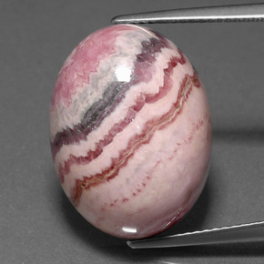 Rodocrosita multicolor natural de 23,72 ct, corte óvalo, opaco