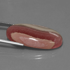 Rodocrosita multicolor natural de 30,73 ct, corte óvalo, opaco