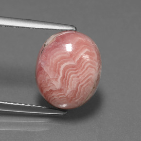 Rodocrosita multicolor natural de 6,39 ct, corte óvalo, opaco