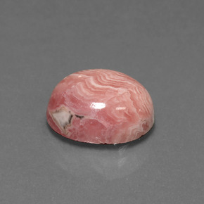 Rodocrosita multicolor natural de 6,39 ct, corte óvalo, opaco