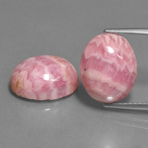 Rodocrosita multicolor natural de 12,39 ct, corte óvalo, opaco