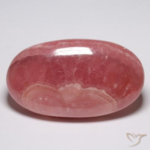 Rodocrosita multicolor natural de 57,65 ct, corte óvalo, translúcido