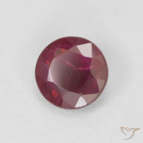 Rubí Rojo oscuro natural de 0.40 ct, Redondo, VS-SI