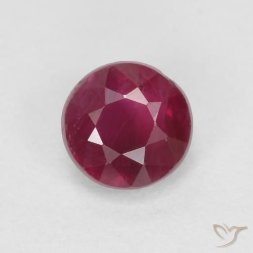 Rubí Rojo oscuro natural de 0.40 ct, Corte Redondo, SI