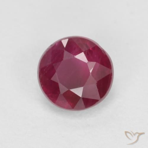 Rubí Rojo oscuro natural de 0.40 ct, Corte Redondo, SI