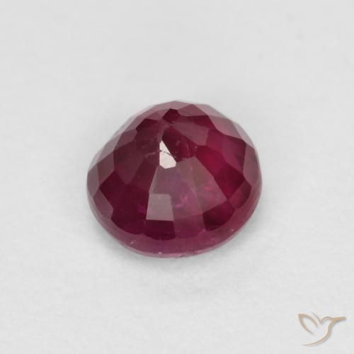 Rubí Rojo oscuro natural de 0.40 ct, Corte Redondo, SI