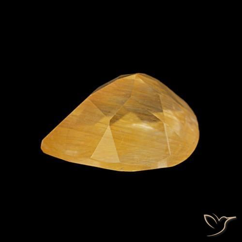Topacio rutilado dorado medio natural de 1,94 ct, en forma de pera, transparente