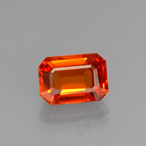 Zafiro naranja natural de 0,77 ct, corte esmeralda, VS