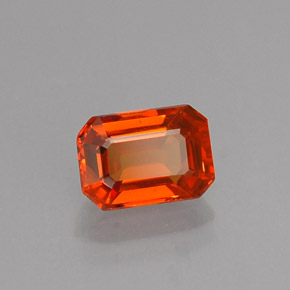 Zafiro naranja natural de 0,77 ct, corte esmeralda, VS