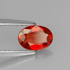 Zafiro naranja natural de 0,60 ct, corte óvalo, VS