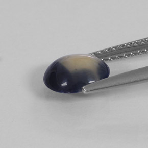 Zafiro bicolor natural de 1,58 ct, corte óvalo, opaco