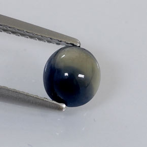 Zafiro bicolor natural de 1,05 ct, corte óvalo, opaco