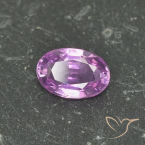 Zafiro Púrpura intenso natural de 0.64 ct, Ovalada, VS
