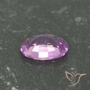 Zafiro Púrpura intenso natural de 0.64 ct, Ovalada, VS
