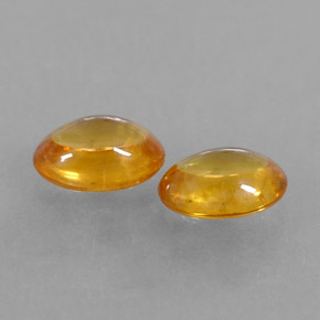 Gemas de zafiro naranja natural de  ct, corte óvalo, transparente