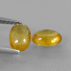 Gemas de zafiro amarillo natural de  ct, corte óvalo, transparente