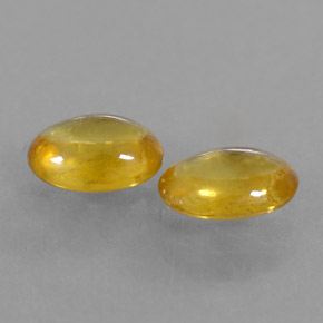 Gemas de zafiro amarillo natural de  ct, corte óvalo, transparente
