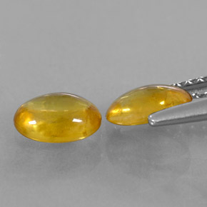 Gemas de zafiro amarillo natural de  ct, corte óvalo, transparente
