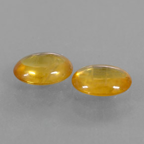 Gemas de zafiro naranja natural de  ct, corte óvalo, transparente