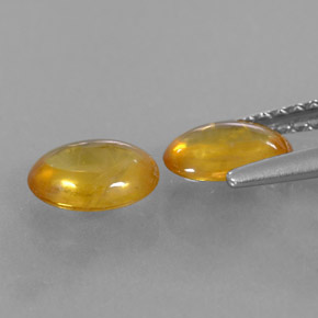 Gemas de zafiro naranja natural de  ct, corte óvalo, transparente