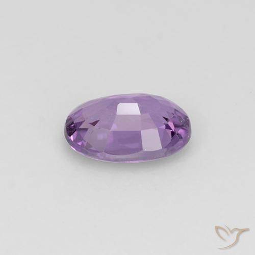 Zafiro Violeta medio claro natural de 0.58 ct, Ovalada, VS