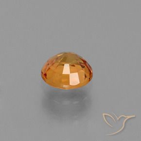 Zafiro Naranja medio natural de 0.73 ct, Redondo, VS