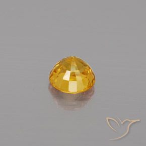 Zafiro Dorado natural de 0.66 ct, Redondo, VS