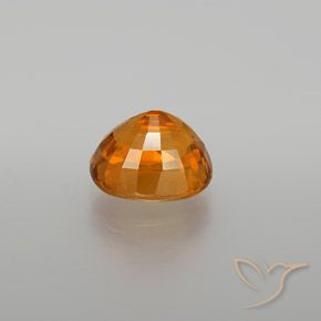 Zafiro Naranja oscuro natural de 3.07 ct, Ovalada, VS
