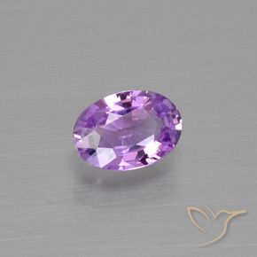 Zafiro Violeta púrpura natural de 0.57 ct, Ovalada, VS