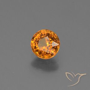 Zafiro Naranja oscuro medio natural de 0.67 ct, Redondo, VS-SI