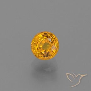 Zafiro Dorado naranja intenso natural de 0.84 ct, Redondo, VS