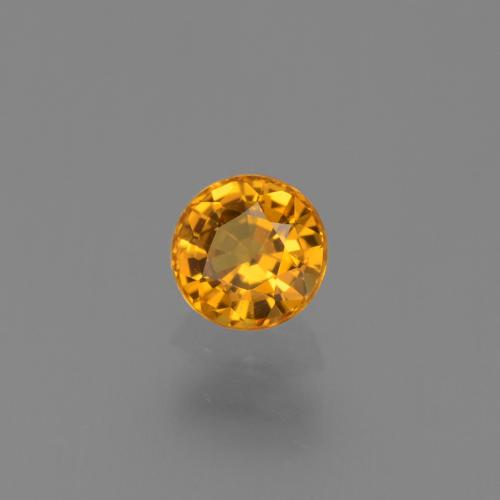 Zafiro Naranja medio natural de 0.68 ct, Redondo, VS