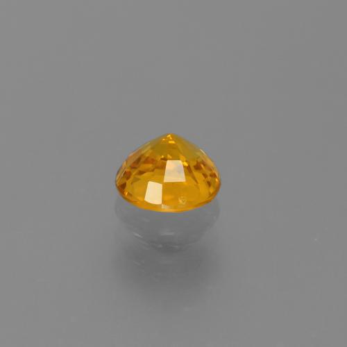 Zafiro Naranja medio natural de 0.68 ct, Redondo, VS