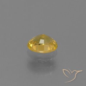 Zafiro Dorado natural de 0.76 ct, Ovalada, VS
