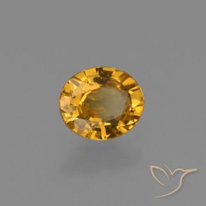 Zafiro Naranja dorado intenso natural de 0.61 ct, Ovalada, VS